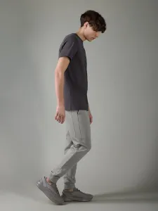 Pánske teplákové nohavice typu jogger z organickej bavlny 4F x Robert Lewandowski