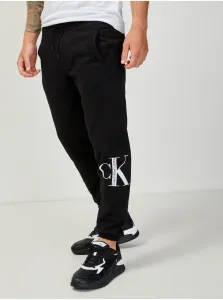 Tepláky Calvin Klein Jeans pánske, čierna farba, s potlačou #630376