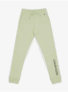 Detské bavlnené tepláky Calvin Klein Jeans zelená farba, s potlačou #5141740