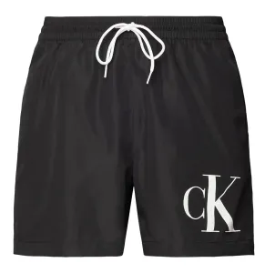 Calvin Klein Pánska sada - kúpacie kraťasy a osuška KM0KM00849-BEH S