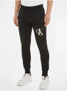 Tepláky Calvin Klein Jeans čierna farba, vzorované