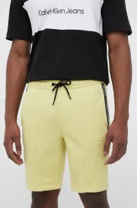 Šortky Calvin Klein Jeans pánske, žltá farba