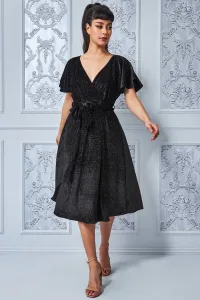 Čierne zamatové midi šaty s flitrami Veľkosť: S