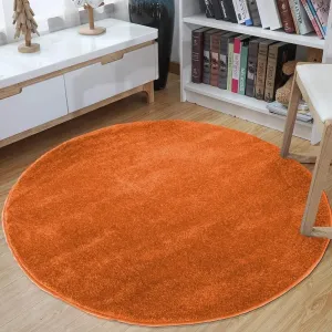 Okrúhly koberec v oranžovej farbe #2878241