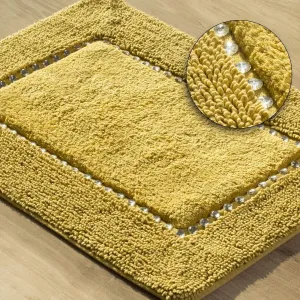 Žltý bavlnený ozdobený koberec do kúpelne #2879989