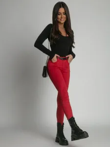 Red jeans with zippers on the legs