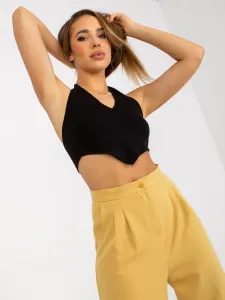 Dark yellow wide trousers made of high-waisted fabric