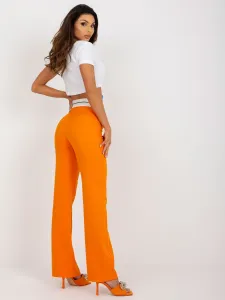 Oranžové elegantné splývavé nohavice