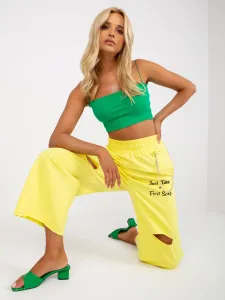 Yellow wide sweatpants with inscriptions