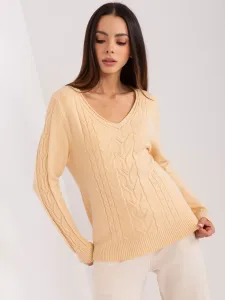 Beige sweater with cables