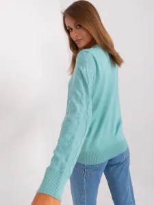 Women's mint sweater with patterns