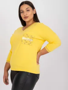 Yellow cotton blouse of larger size with decorative pocket