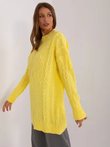 Yellow knitted sweater with cables