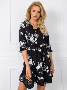 Black dress with artificial flowers #4765587