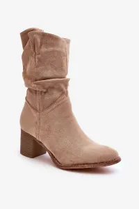 Beige shaved women's insulated boots with a gathered upper with a high heel