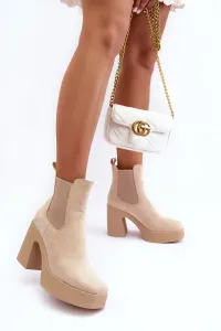 Beige suede ankle boots on a massive high heel by Sunilda