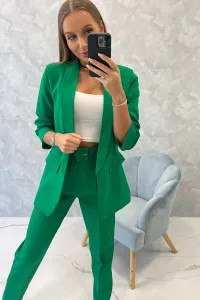 Elegant set of jacket and trousers green color
