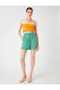 Koton Floral Mini Shorts that are tied at the waist with pockets