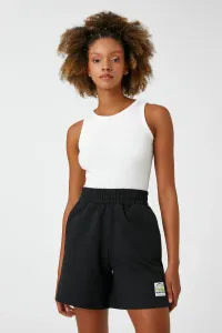 Koton Mini Shorts with a thick elasticated waist. Pockets Tag Detail