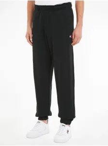 Bavlnené tepláky Tommy Jeans pánske, čierna farba, jednofarebné #6327244
