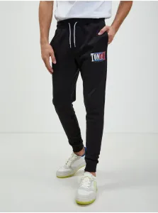 Bavlnené tepláky Tommy Jeans pánske, čierna farba, s potlačou
