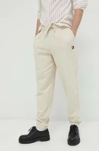 Bavlnené tepláky Tommy Jeans pánske, béžová farba, jednofarebné #9259908